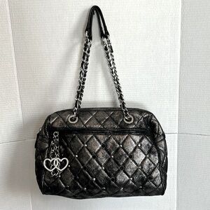 Betsy Johnson 100% leather, two strap bag.